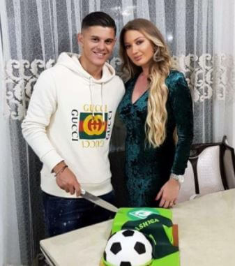 Milot Rashica with his wife celebrating the victory together.